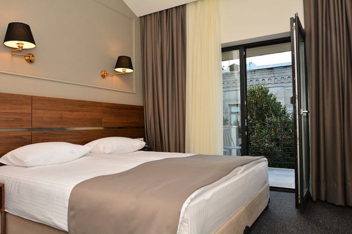 Imagen de la habitación del Hotel Garnet Tbilisi. Foto 16
