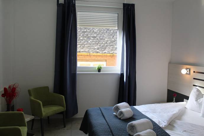 Imagen de la habitación del Hotel Garni 11Tica DM. Foto 2