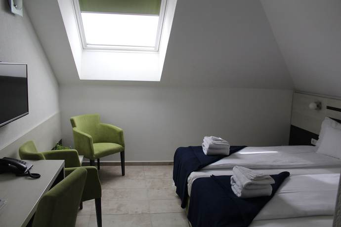 Imagen de la habitación del Hotel Garni 11Tica DM. Foto 5