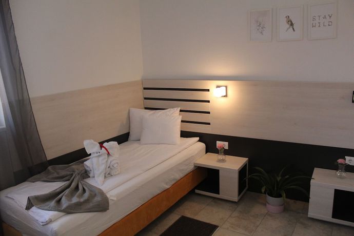 Imagen de la habitación del Hotel Garni 11Tica DM. Foto 14