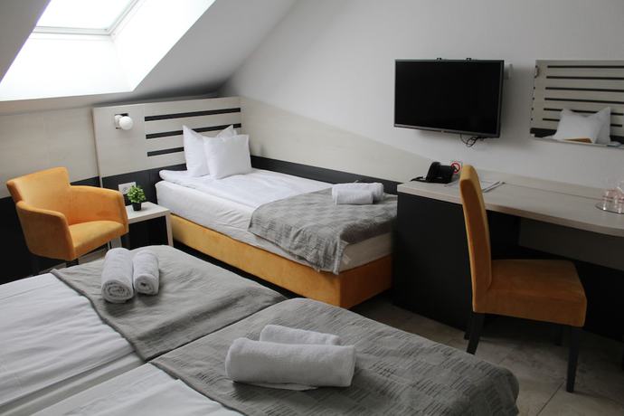 Imagen de la habitación del Hotel Garni 11Tica DM. Foto 15