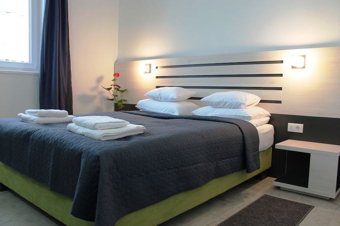 Imagen de la habitación del Hotel Garni 11Tica DM. Foto 18