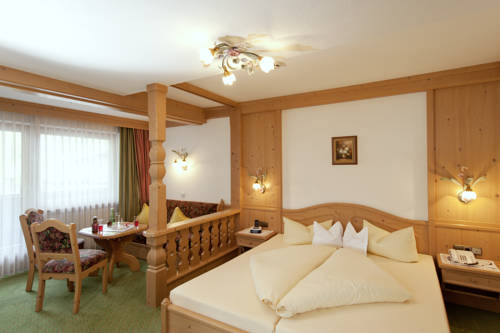 Imagen de la habitación del Hotel Garni Alpenland. Foto 10