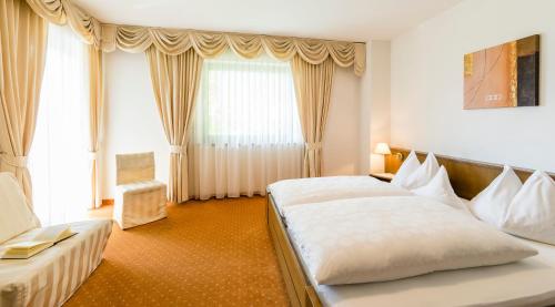 Imagen de la habitación del Hotel Garni Am Meilenstein. Foto 9