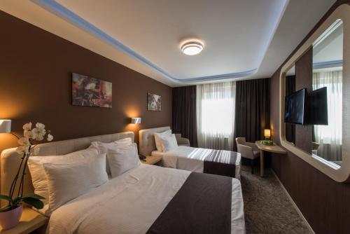 Imagen de la habitación del Hotel Garni Aveny. Foto 7