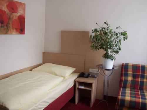 Imagen de la habitación del Hotel Garni Bettina. Foto 13