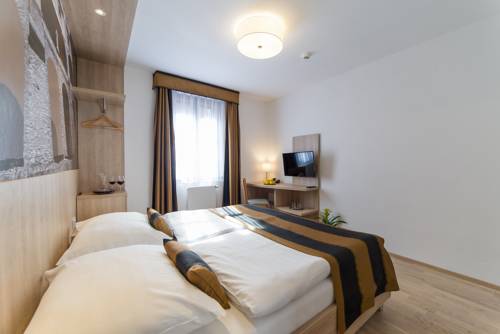 Imagen de la habitación del Hotel Garni Castle Bridge. Foto 7