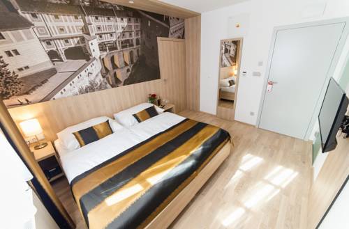 Imagen de la habitación del Hotel Garni Castle Bridge. Foto 13