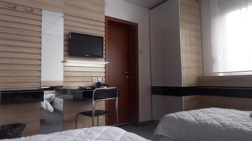 Imagen de la habitación del Hotel Garni Consul. Foto 6