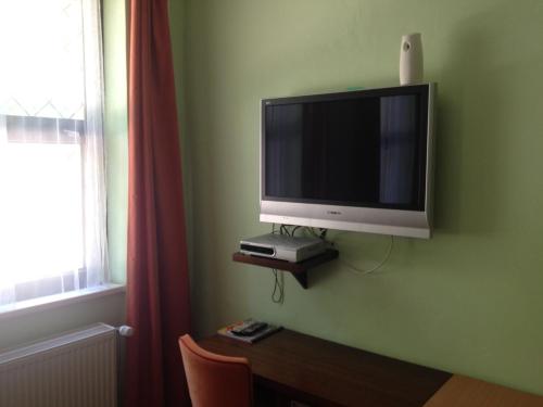 Imagen de la habitación del Hotel Garni Cosmopolitan. Foto 9
