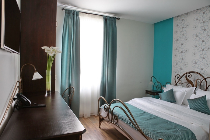 Imagen de la habitación del Hotel Garni Dum. Foto 4