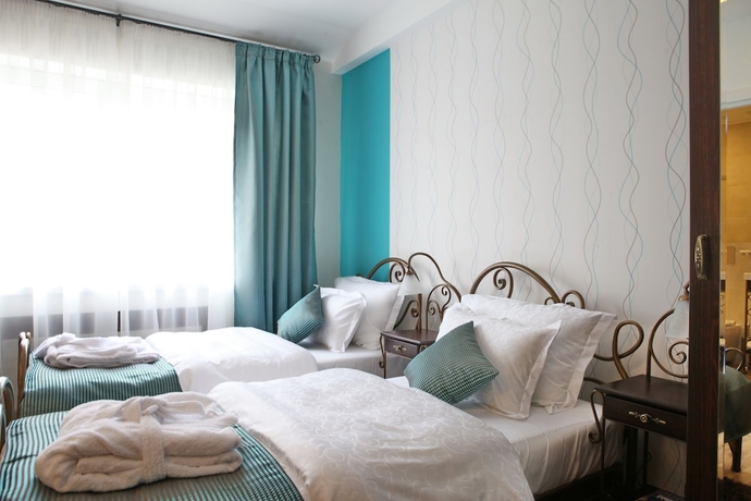 Imagen de la habitación del Hotel Garni Dum. Foto 5