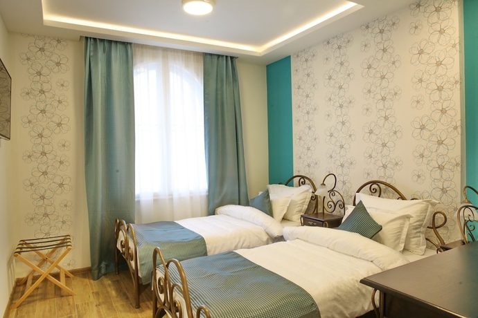 Imagen de la habitación del Hotel Garni Dum. Foto 13