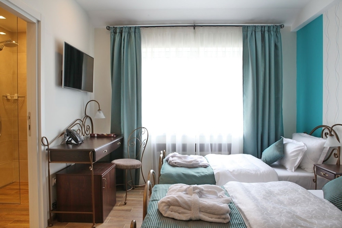 Imagen de la habitación del Hotel Garni Dum. Foto 14