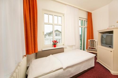 Imagen de la habitación del Hotel Garni Eden Hotels. Foto 10