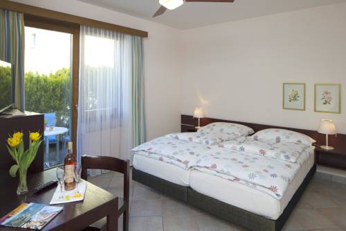 Imagen de la habitación del Hotel Garni Elena. Foto 9