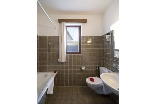 Imagen de la habitación del Hotel Garni Elena. Foto 13