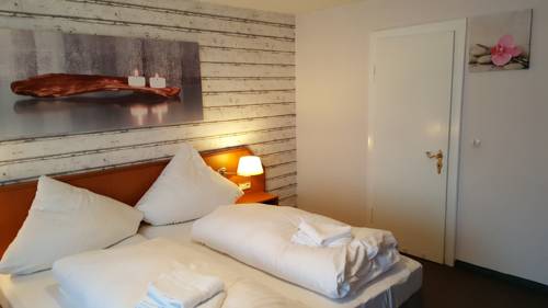 Imagen de la habitación del Hotel Garni Engel Altenau. Foto 7