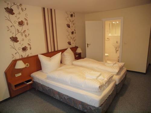 Imagen de la habitación del Hotel Garni Engel Altenau. Foto 12