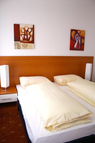 Imagen de la habitación del Hotel Garni Evido KG Salzburg. Foto 19