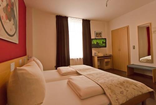 Imagen de la habitación del Hotel Garni Forum. Foto 10