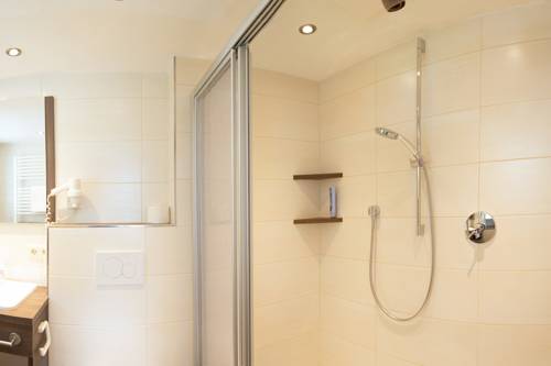 Imagen de la habitación del Hotel Garni Grünmoos. Foto 8