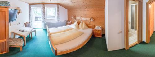 Imagen de la habitación del Hotel Garni Grünmoos. Foto 11