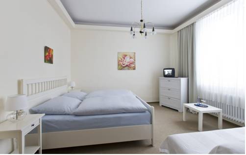 Imagen de la habitación del Hotel Garni Haus Am Karpfenteich. Foto 9