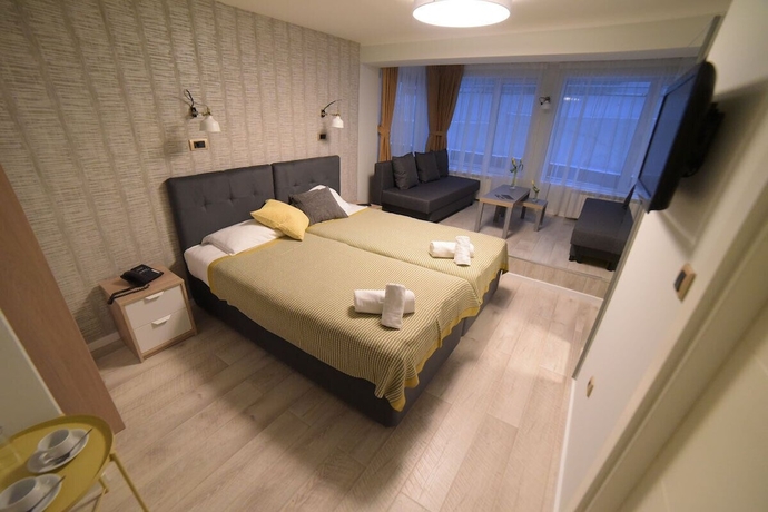 Imagen de la habitación del Hotel Garni House 46 Plus. Foto 15