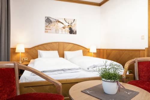 Imagen de la habitación del Hotel Garni Hubertushof. Foto 13