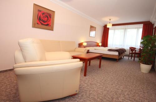 Imagen de la habitación del Hotel Garni Jagdschloss Waldsee mit Schlossk&uuml;che f&uuml;r Selbstversorger. Foto 6