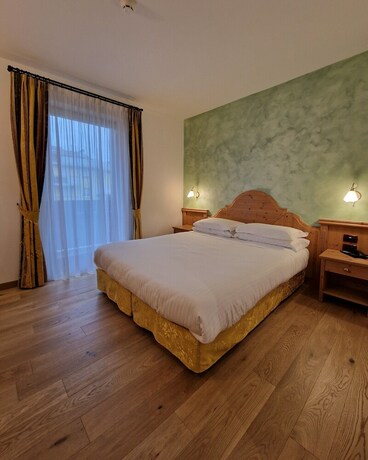 Imagen de la habitación del Hotel Garni La Vigna. Foto 17