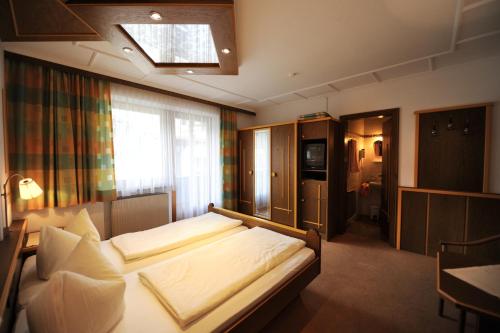 Imagen de la habitación del Hotel Garni Landhaus Platzer. Foto 16