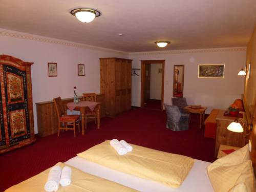 Imagen de la habitación del Hotel Garni Landhaus Trenkenbach. Foto 3