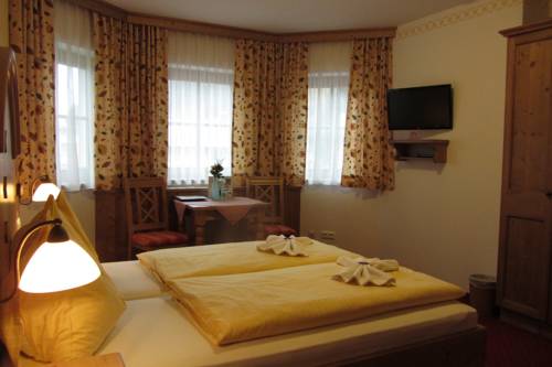 Imagen de la habitación del Hotel Garni Landhaus Trenkenbach. Foto 10
