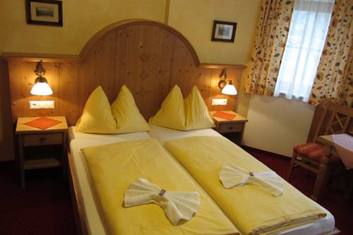Imagen de la habitación del Hotel Garni Landhaus Trenkenbach. Foto 11
