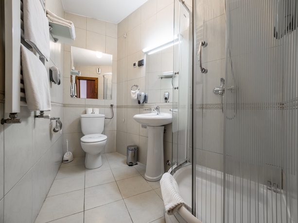 Imagen de la habitación del Hotel Garni Le Petit Piaf. Foto 8