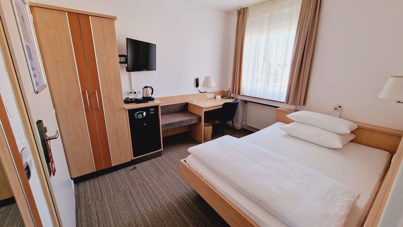 Imagen de la habitación del Hotel Garni Metzingen. Foto 8