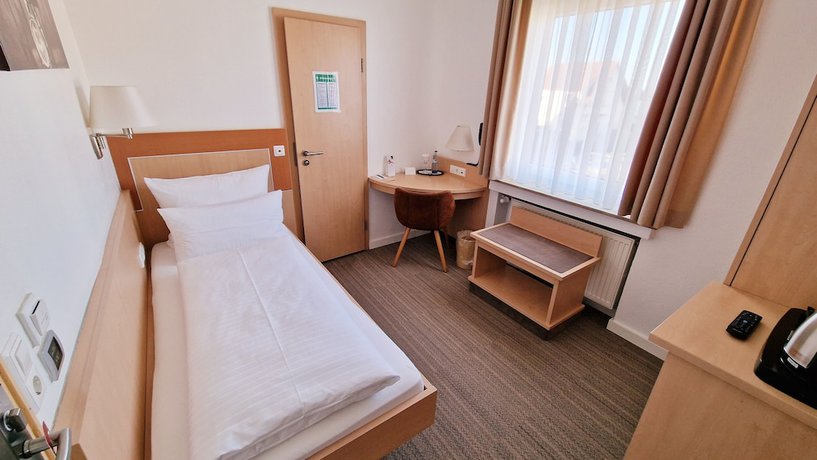 Imagen de la habitación del Hotel Garni Metzingen. Foto 10