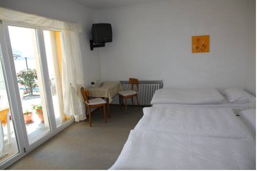 Imagen de la habitación del Hotel Garni Morettina. Foto 15