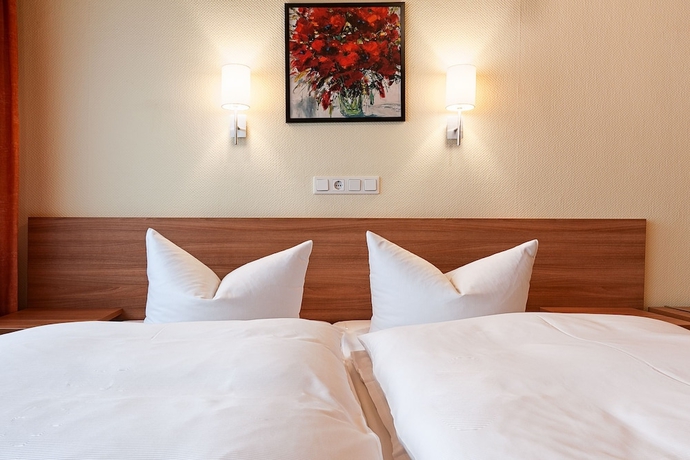 Imagen de la habitación del Hotel Garni Nuernberger Trichter. Foto 10