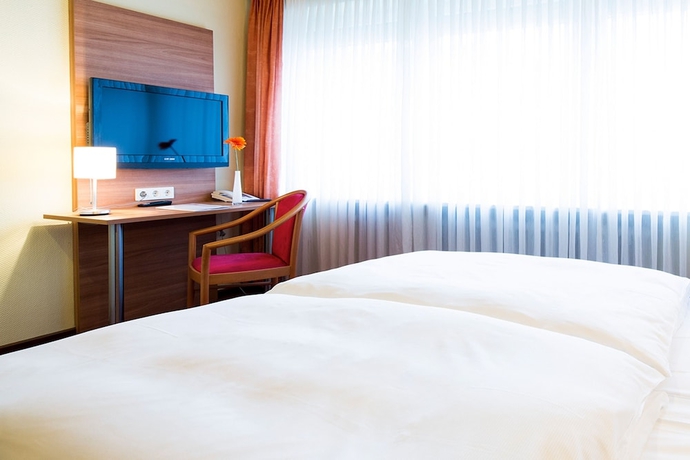 Imagen de la habitación del Hotel Garni Nuernberger Trichter. Foto 11