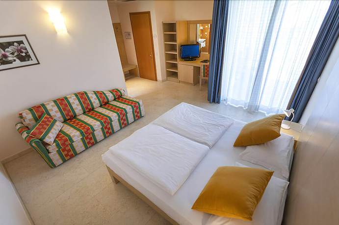 Imagen de la habitación del Hotel Garni Orchidea. Foto 5