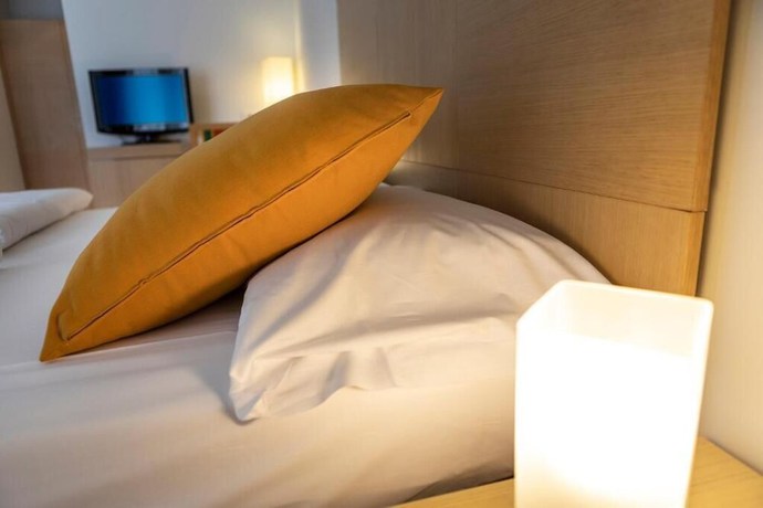 Imagen de la habitación del Hotel Garni Orchidea. Foto 9