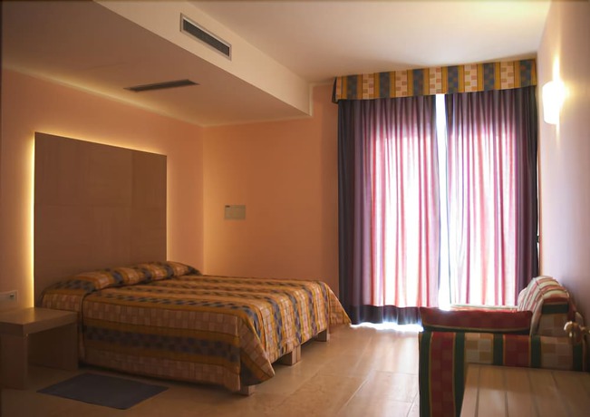 Imagen de la habitación del Hotel Garni Orchidea. Foto 10