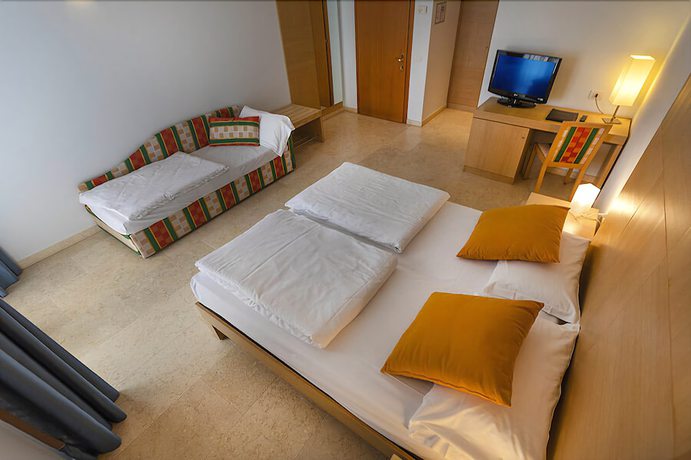 Imagen de la habitación del Hotel Garni Orchidea. Foto 12