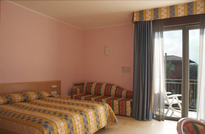 Imagen de la habitación del Hotel Garni Orchidea. Foto 15