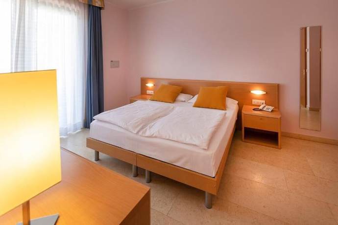 Imagen de la habitación del Hotel Garni Orchidea. Foto 18
