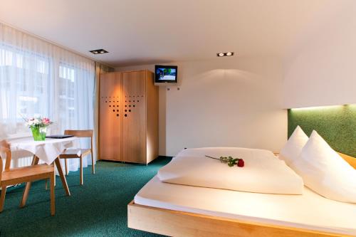 Imagen de la habitación del Hotel Garni Pfeifer. Foto 19