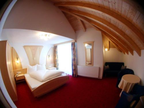 Imagen de la habitación del Hotel Garni Pradella. Foto 18